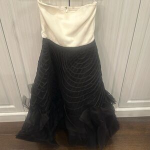 White and black color block strapless dress. Zipper in back.